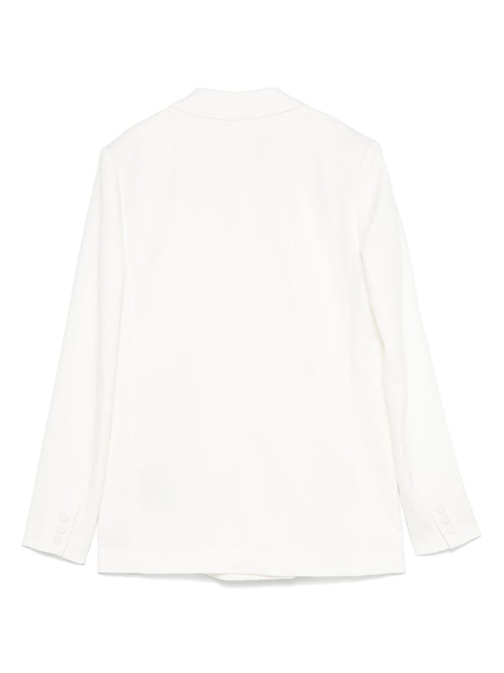 Federica Tosi
Blazer con revers a lancia.