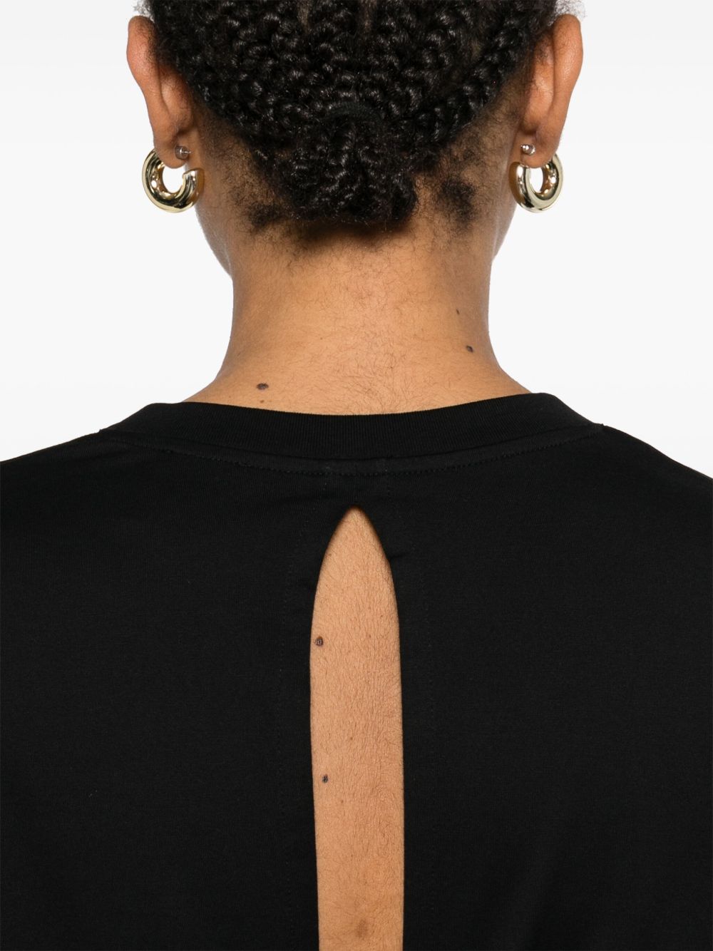 Givenchy
T-shirt con apertura sul retro
