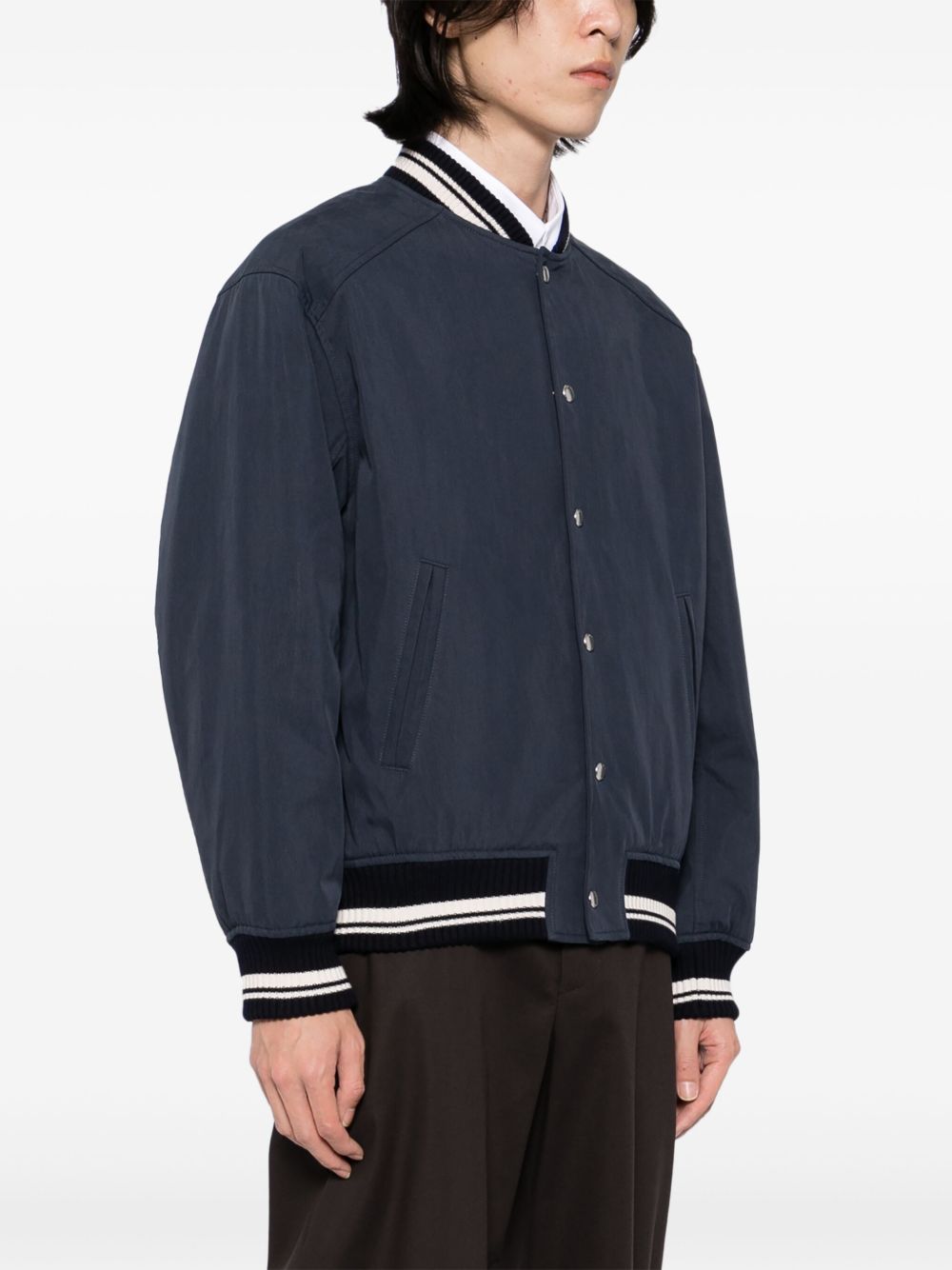 Maison Kitsuné
Bomber con applicazione