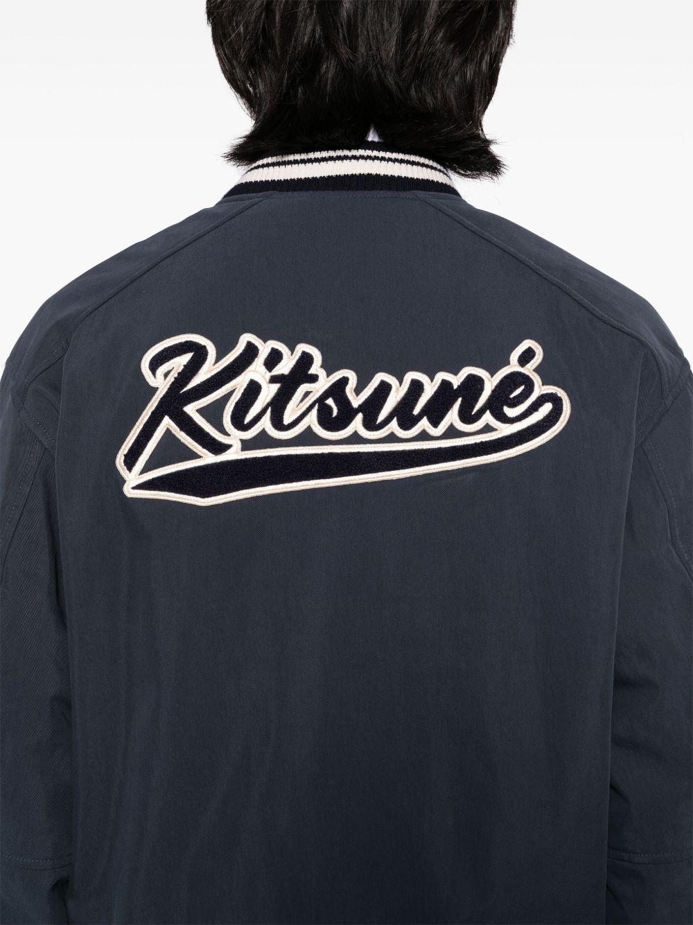 Maison Kitsuné
Bomber con applicazione