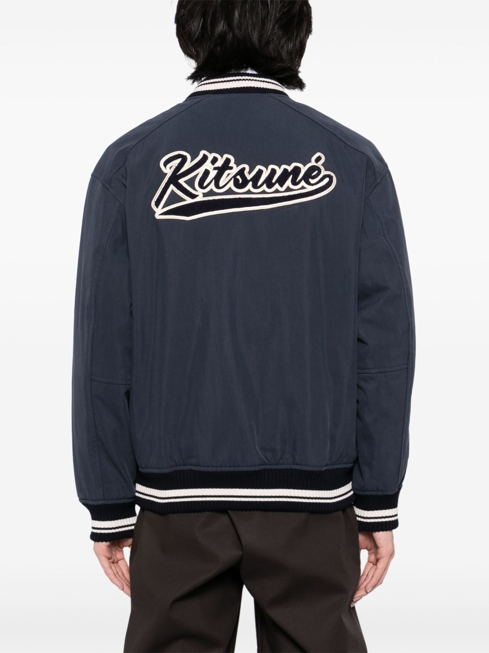 Maison Kitsuné
Bomber con applicazione
