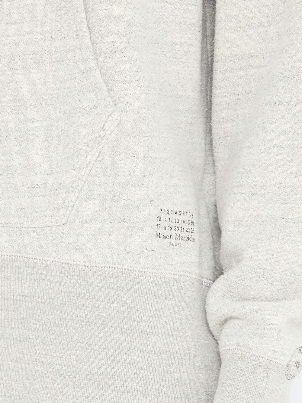 Maison Margiela
Maglione con scollo a V