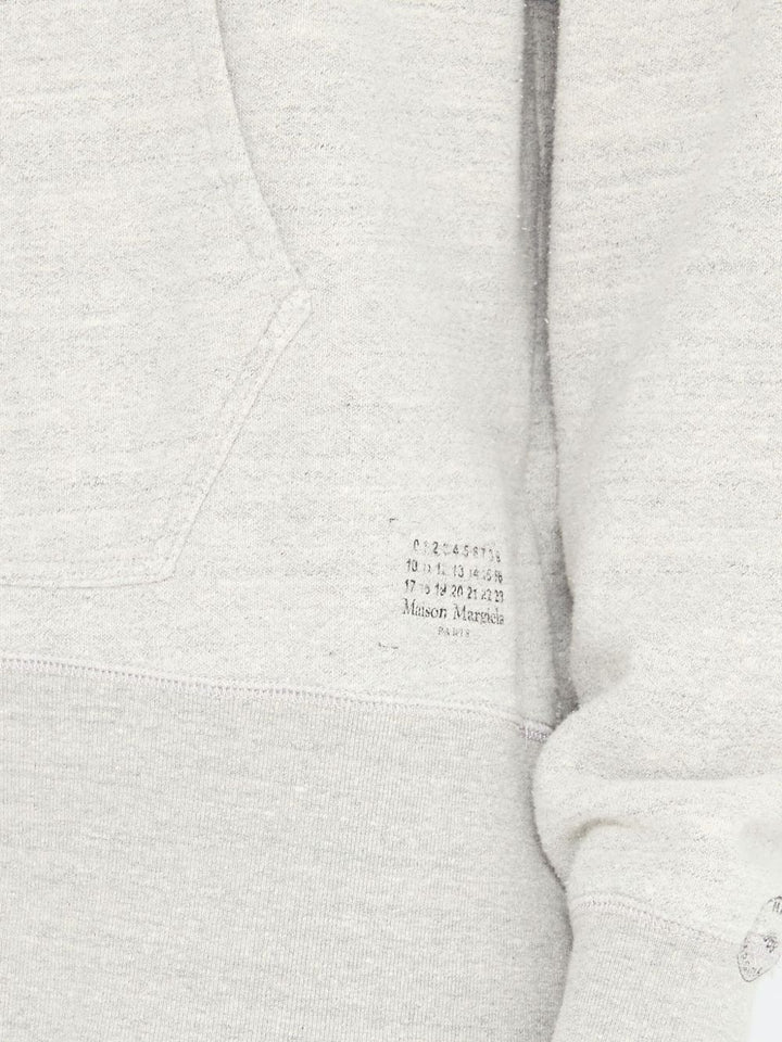 Maison Margiela
Maglione con scollo a V