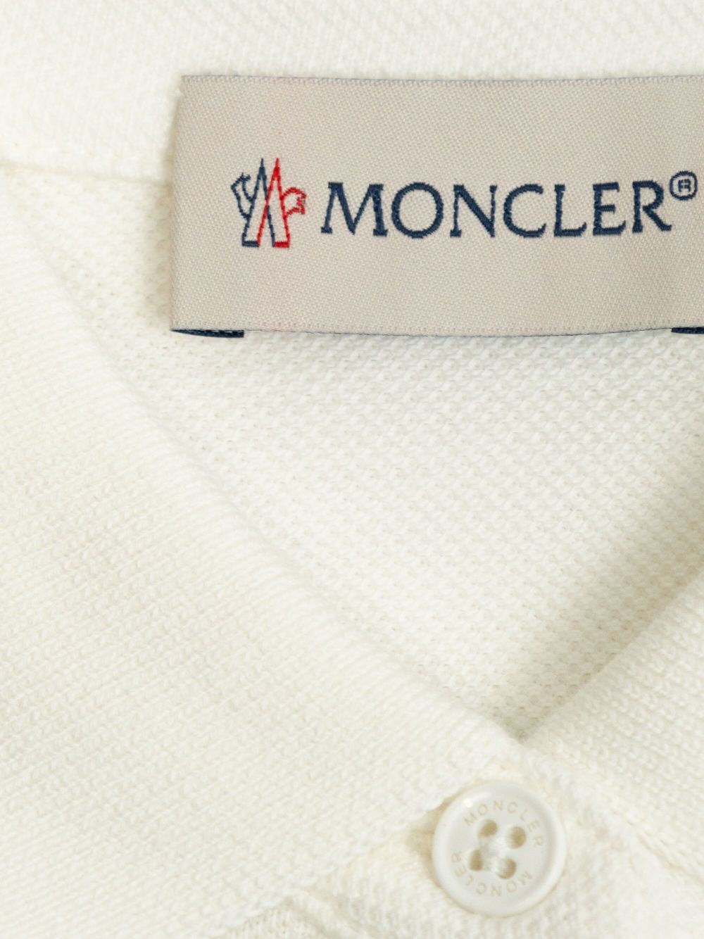 Moncler Enfant
Polo in cotone con ricamo logo