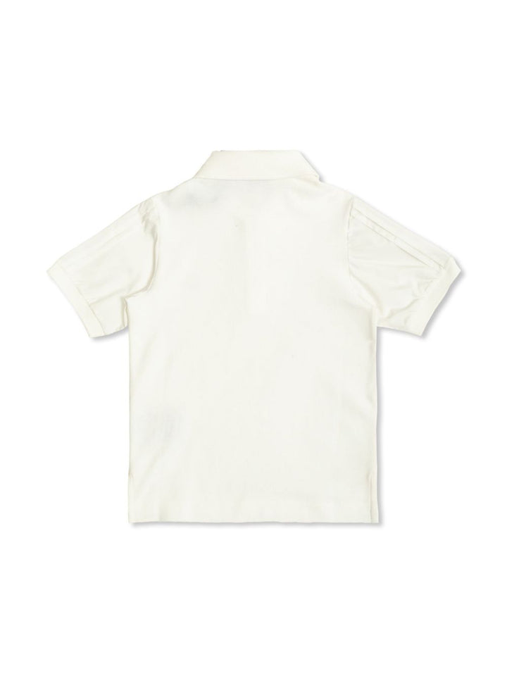 Moncler Enfant
Polo in cotone con ricamo logo