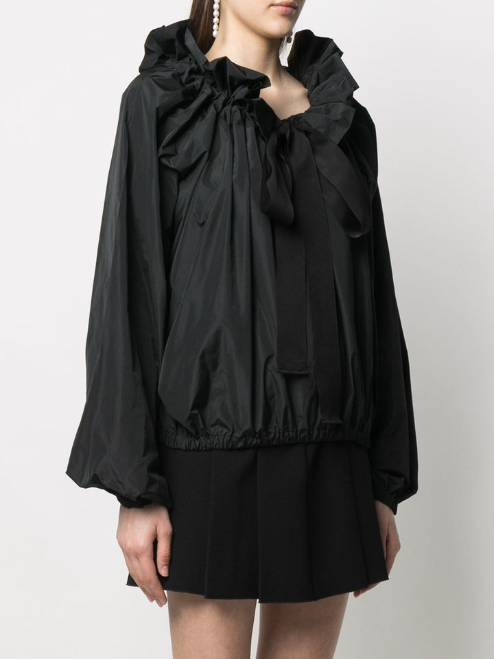 Patou
Blusa con coulisse