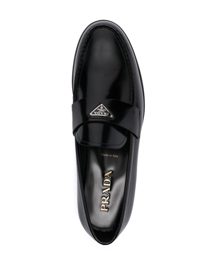 Prada
Mocassini con logo