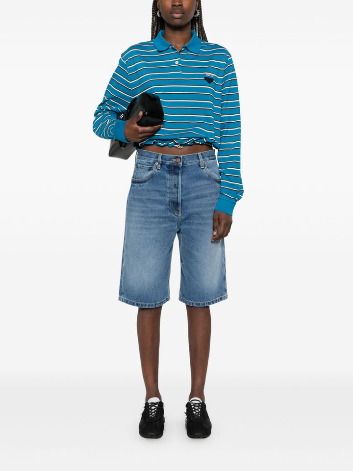 Prada
Shorts denim con applicazione