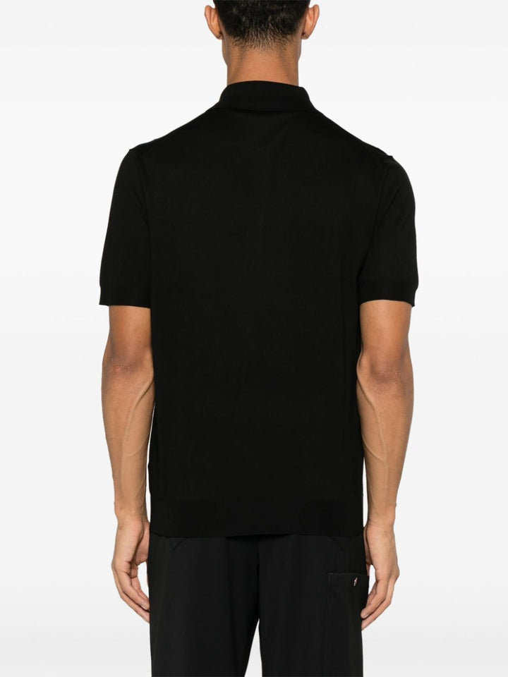 Prada
Polo con ricamo logo