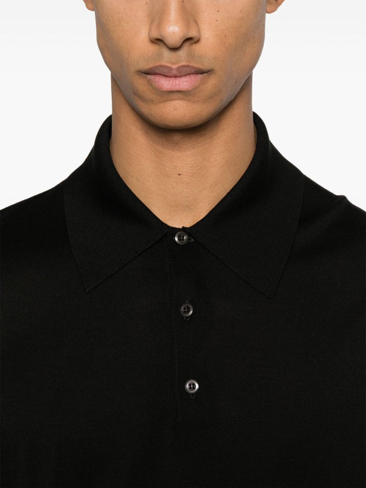 Prada
Polo con ricamo logo