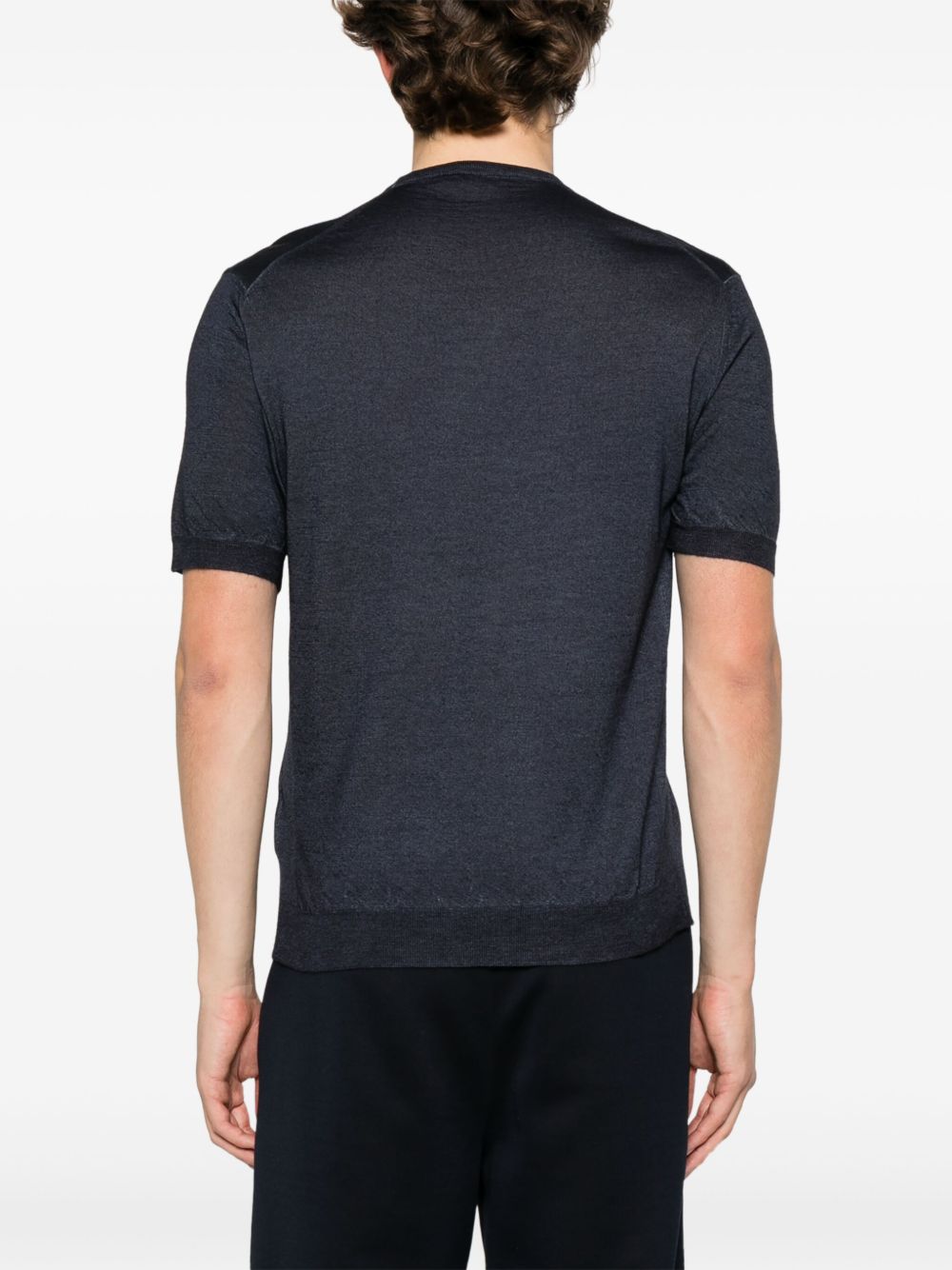 Prada
T-shirt con logo ricamato