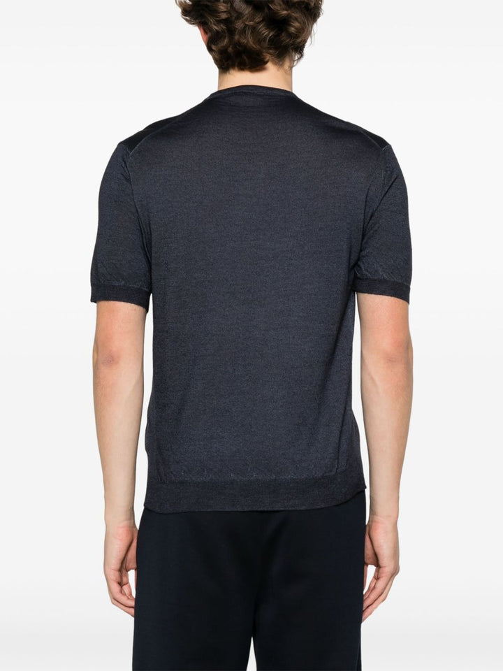 Prada
T-shirt con logo ricamato