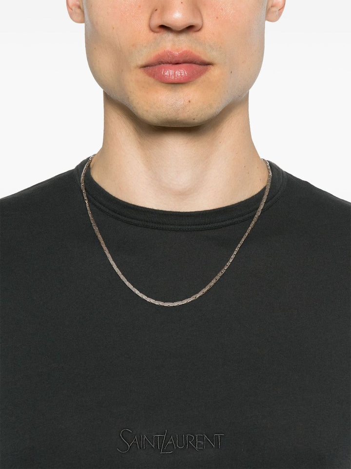 Saint Laurent
T-shirt nera slavata in cotone.