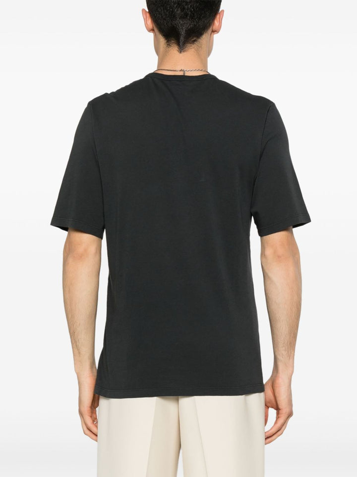 Saint Laurent
T-shirt nera slavata in cotone.