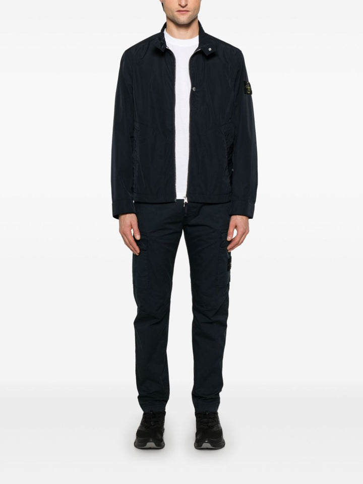 Stone Island
Pantaloni con applicazione Compass