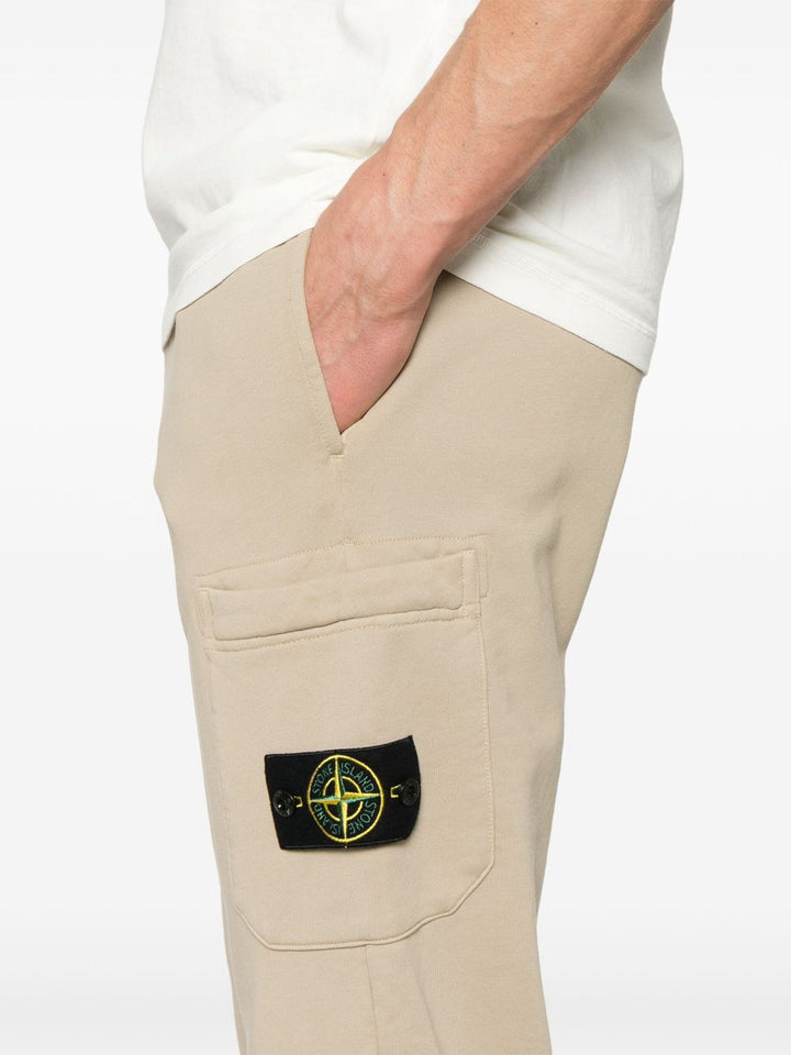 Stone Island
Pantaloni sportivi con applicazione Compass