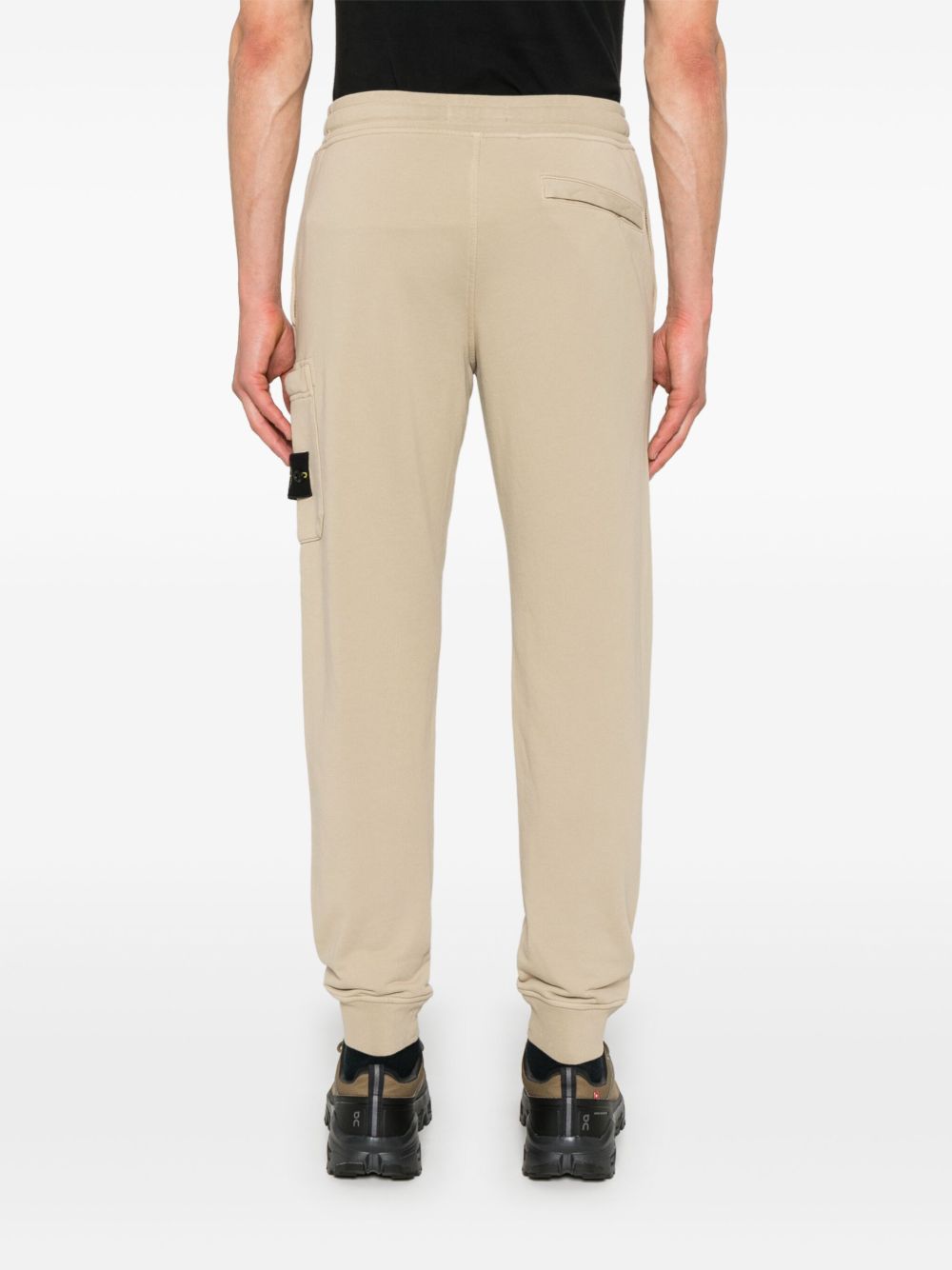 Stone Island
Pantaloni sportivi con applicazione Compass