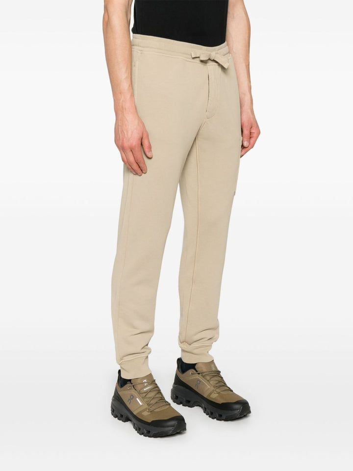 Stone Island
Pantaloni sportivi con applicazione Compass