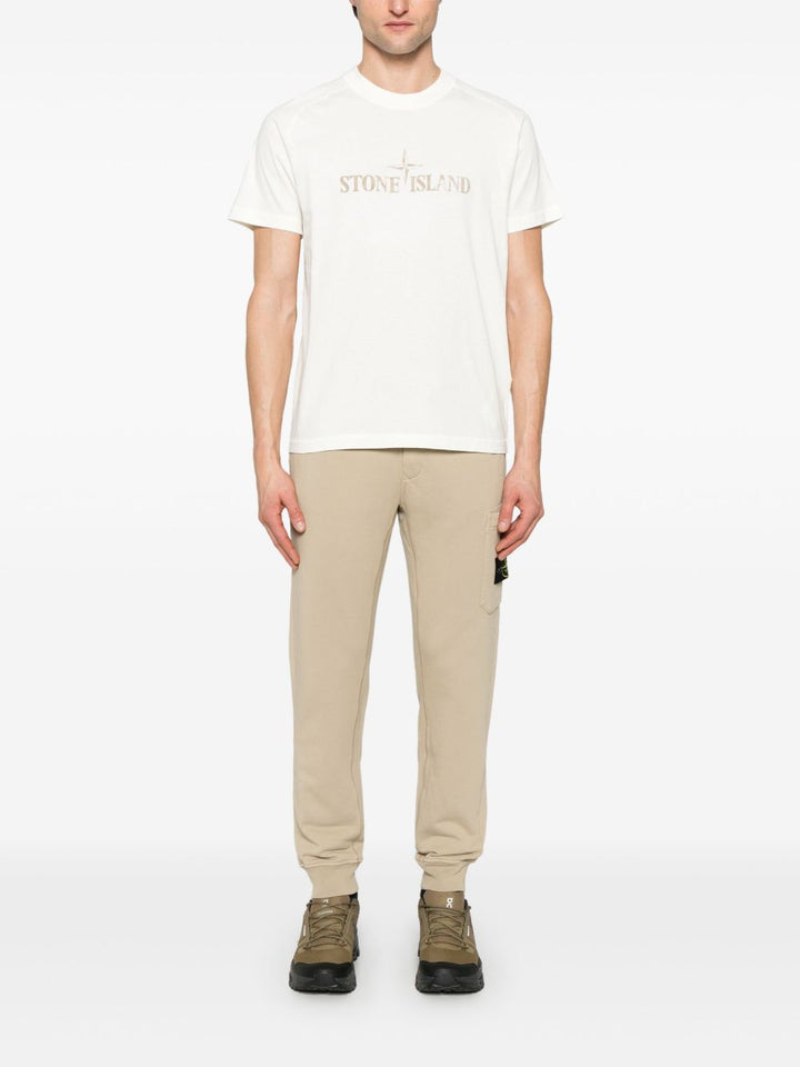 Stone Island
Pantaloni sportivi con applicazione Compass