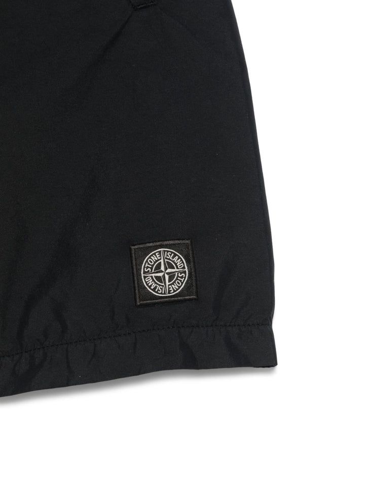 Stone Island Junior
Costume da bagno con applicazione Compass