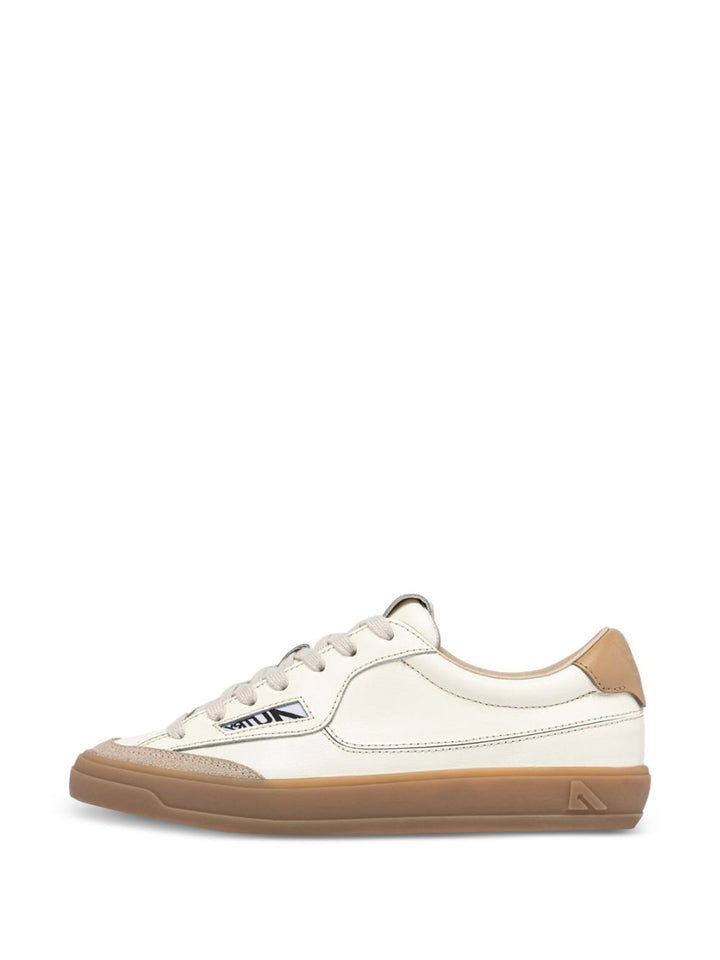 Sneakers con inserti in pelle scamosciata e patch logo