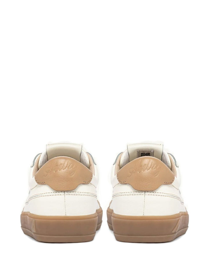 Sneakers con inserti in pelle scamosciata e patch logo