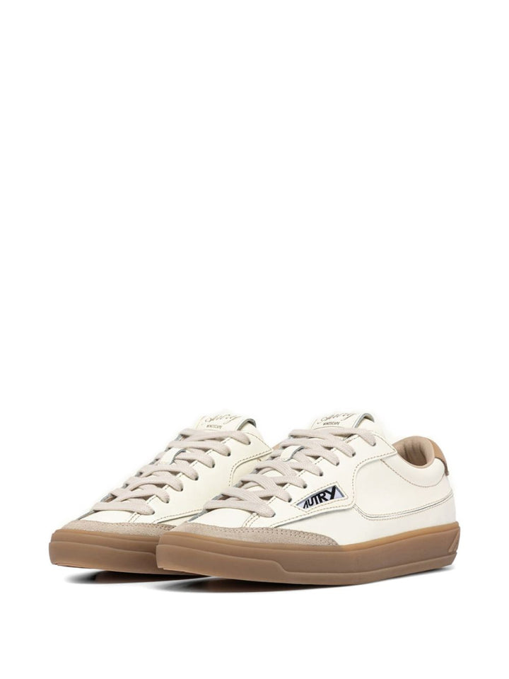 Sneakers con inserti in pelle scamosciata e patch logo