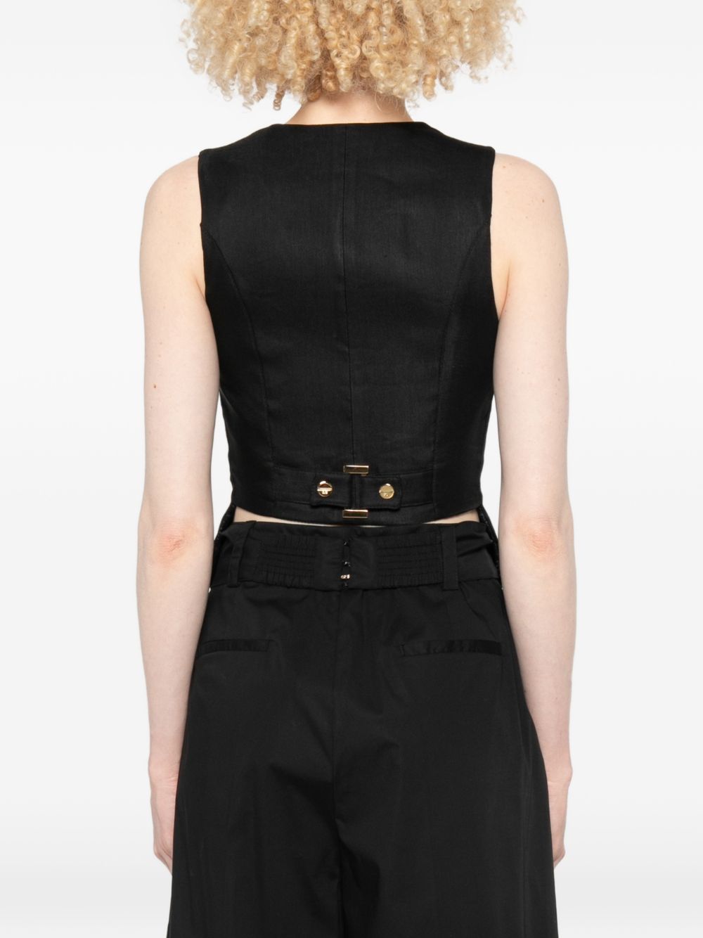 Gilet con bottoni e taschini e scollo a V