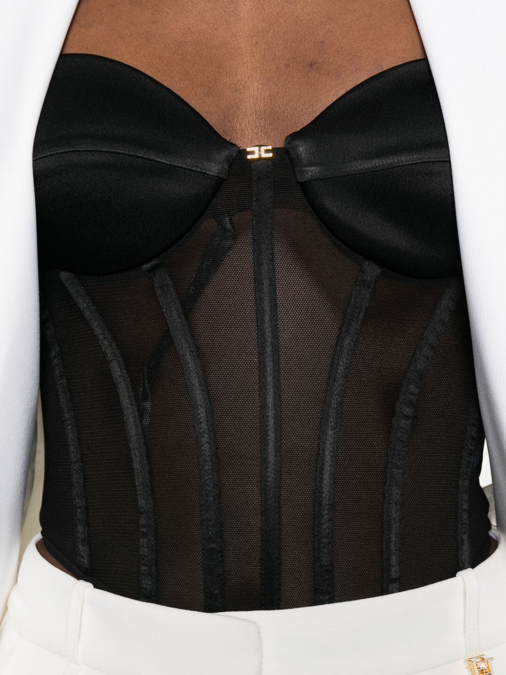 Top corsetto in rete