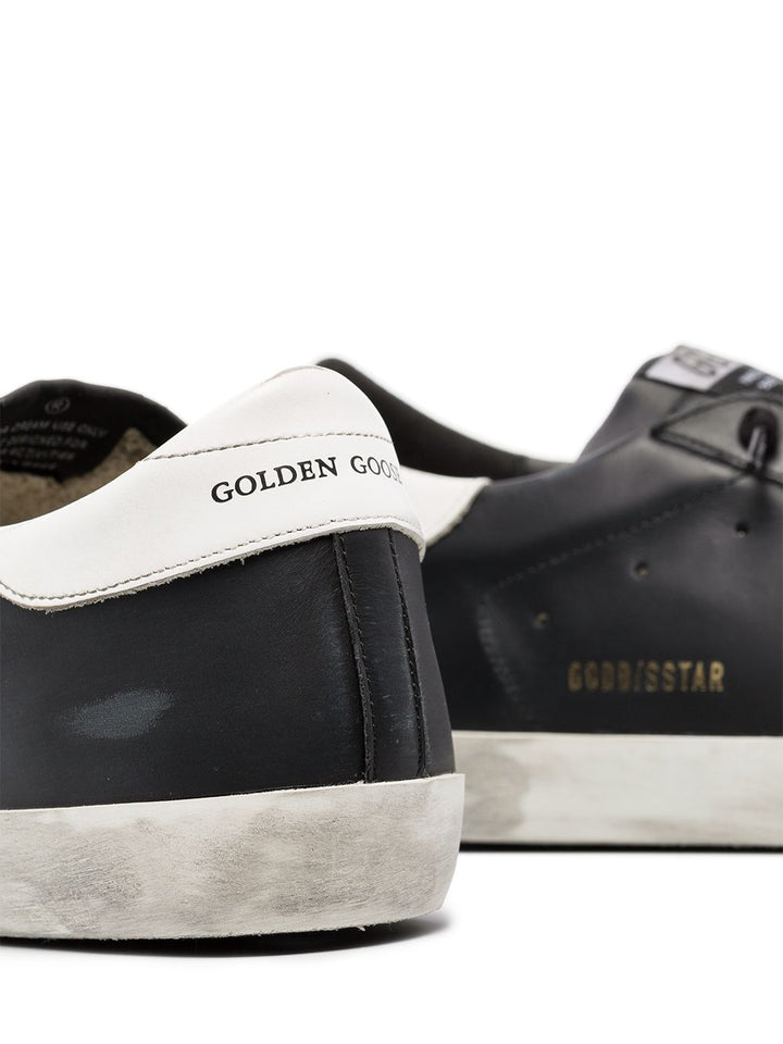Sneakers Superstar nera  effetto pelle vissuta