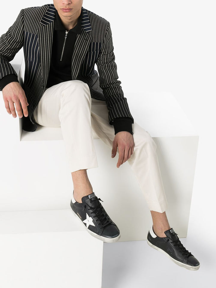 Sneakers Superstar nera  effetto pelle vissuta