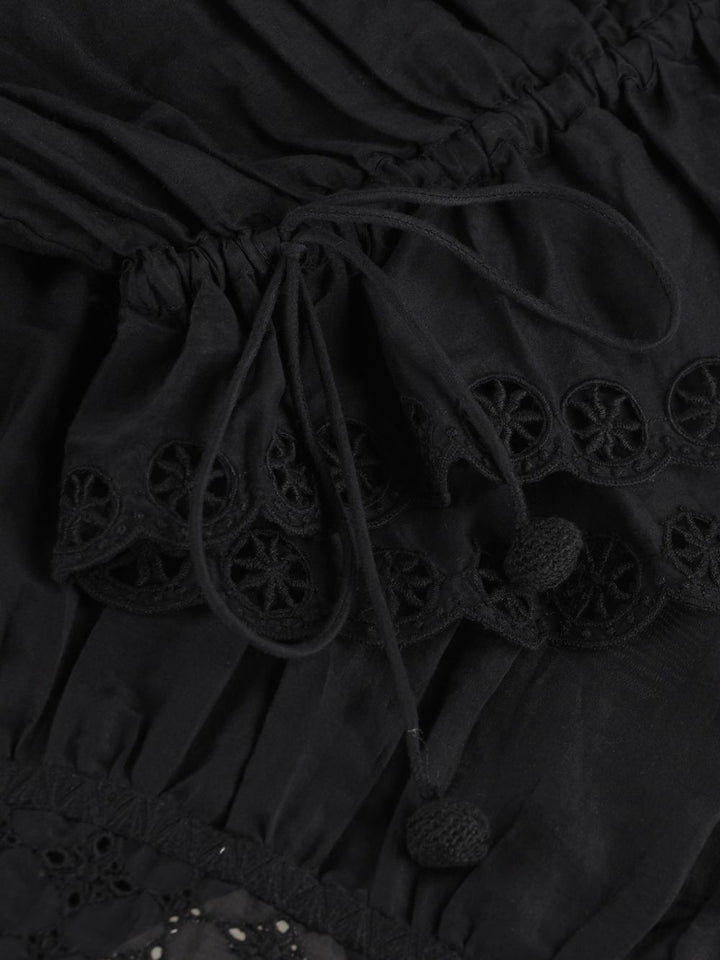 Blusa con volant in pizzo sangallo