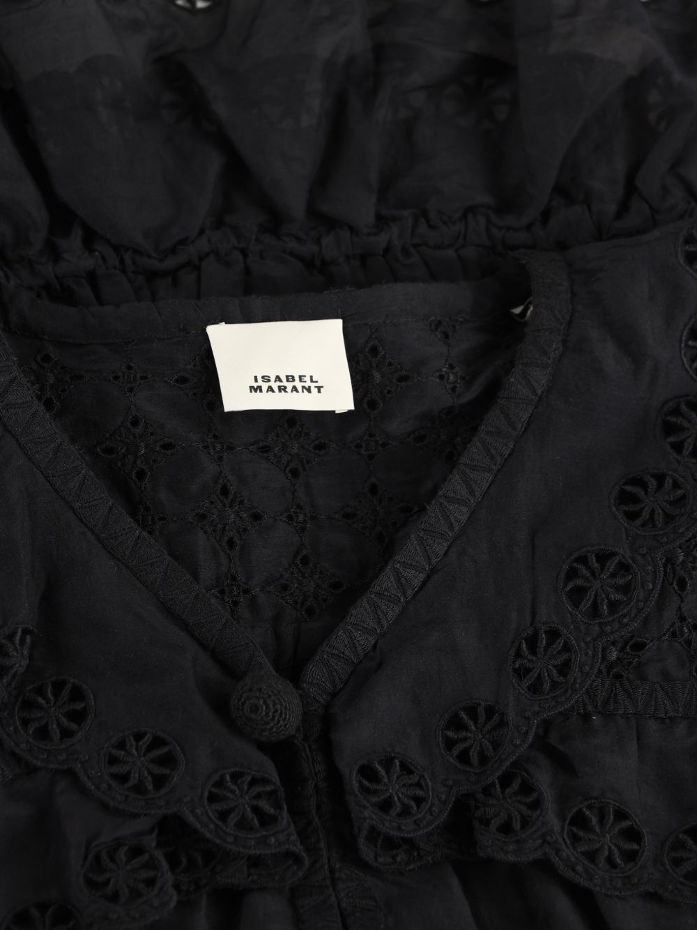 Blusa con volant in pizzo sangallo