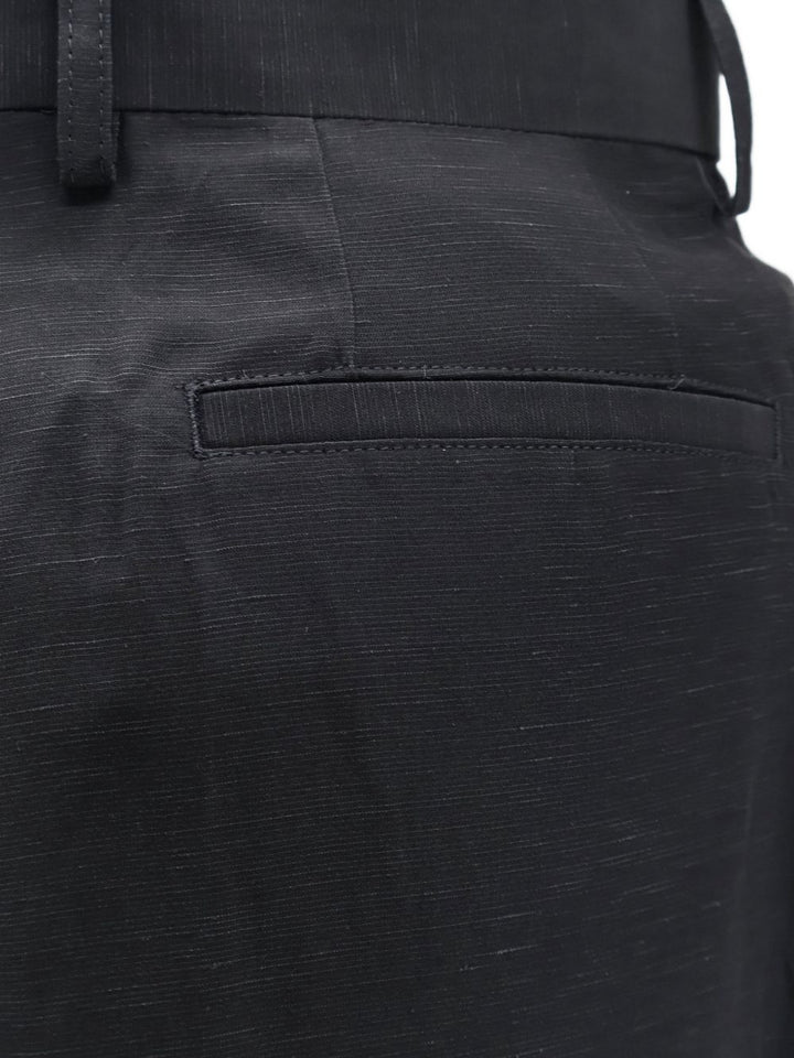 Pantaloni con bottoni