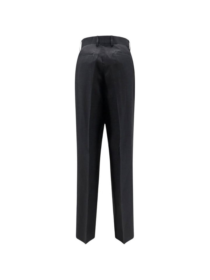 Pantaloni con bottoni