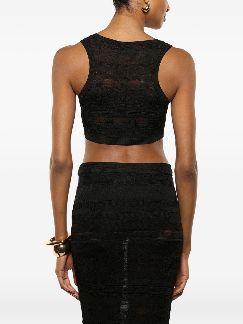Top crop lavorato a maglia con cut-out