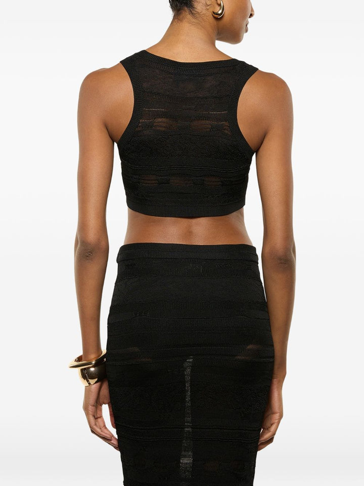 Top crop lavorato a maglia con cut-out