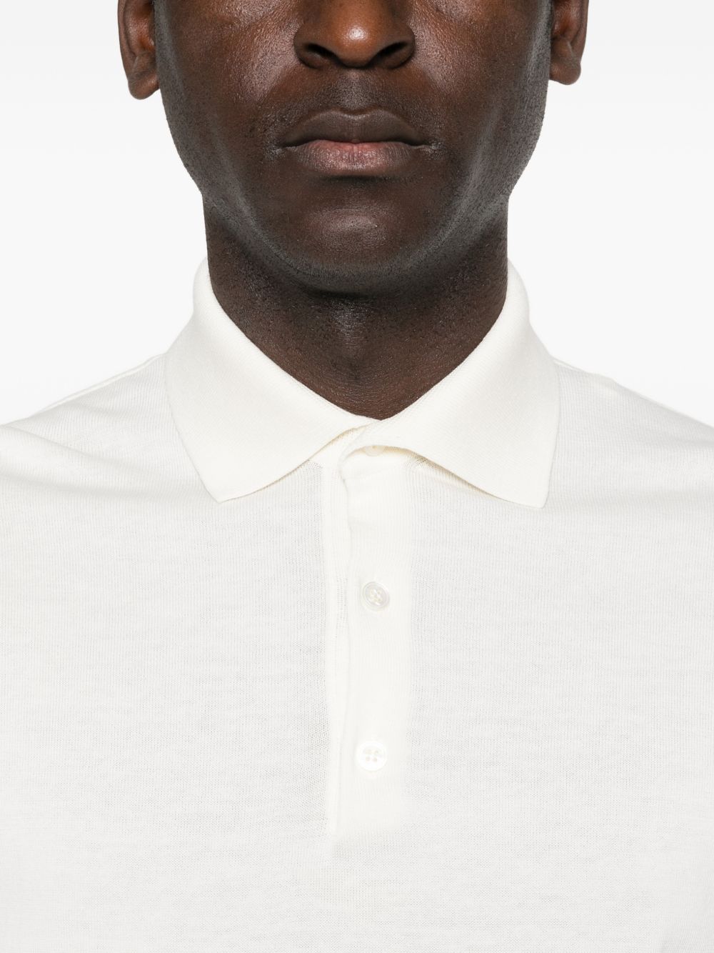 Polo in maglia con bottoni