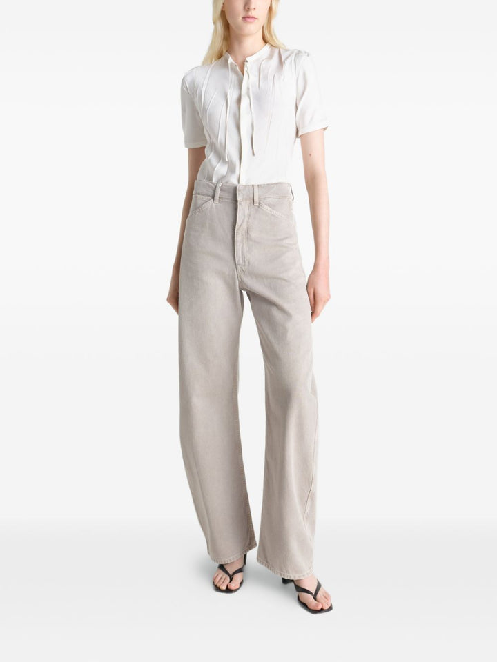 Pantaloni a vita alta con cuciture ritorte