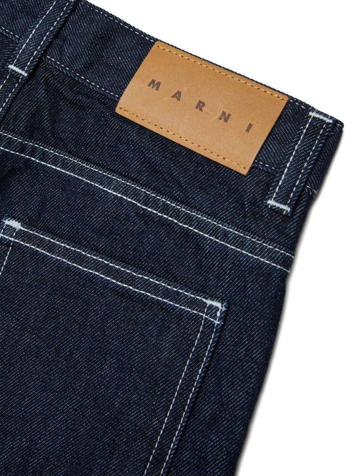 Jeans con bottoni