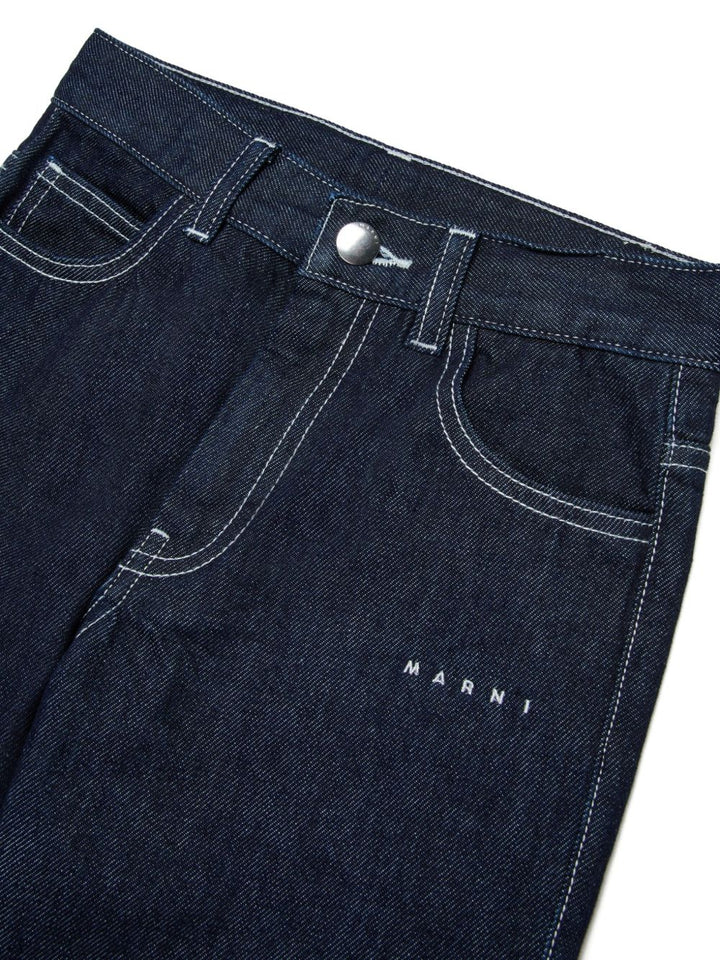 Jeans con bottoni