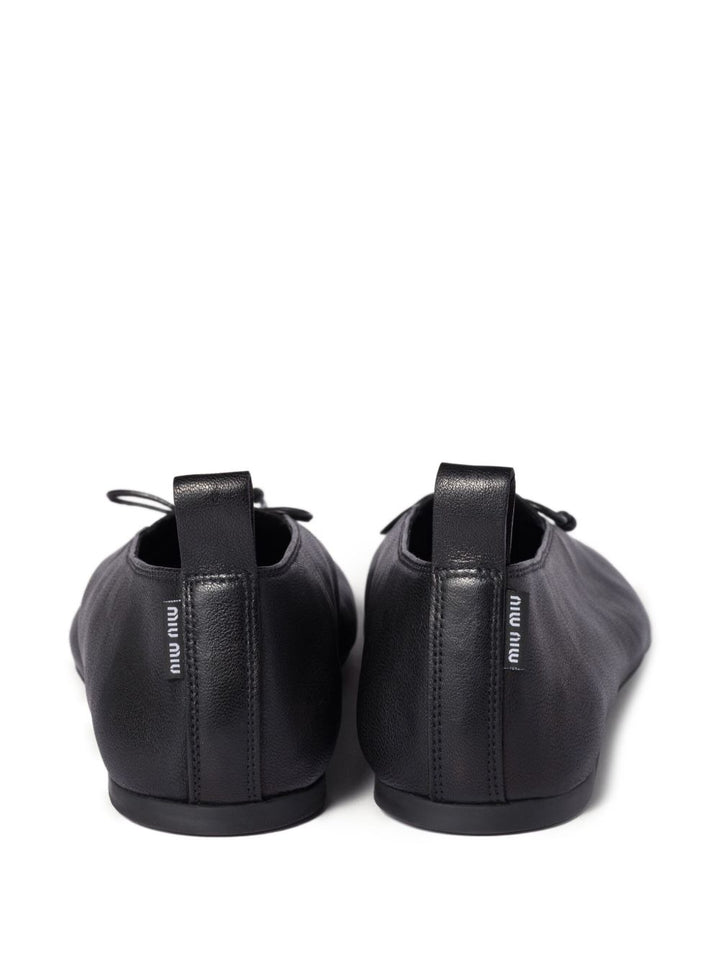 Ballerine "Élan" in pelle con fiocco