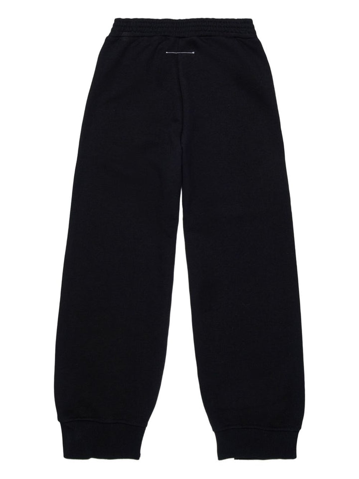 pantaloni con orlo diviso