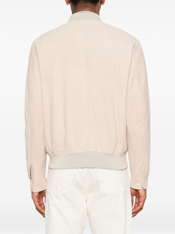 Giubbino con tasche abbottonate