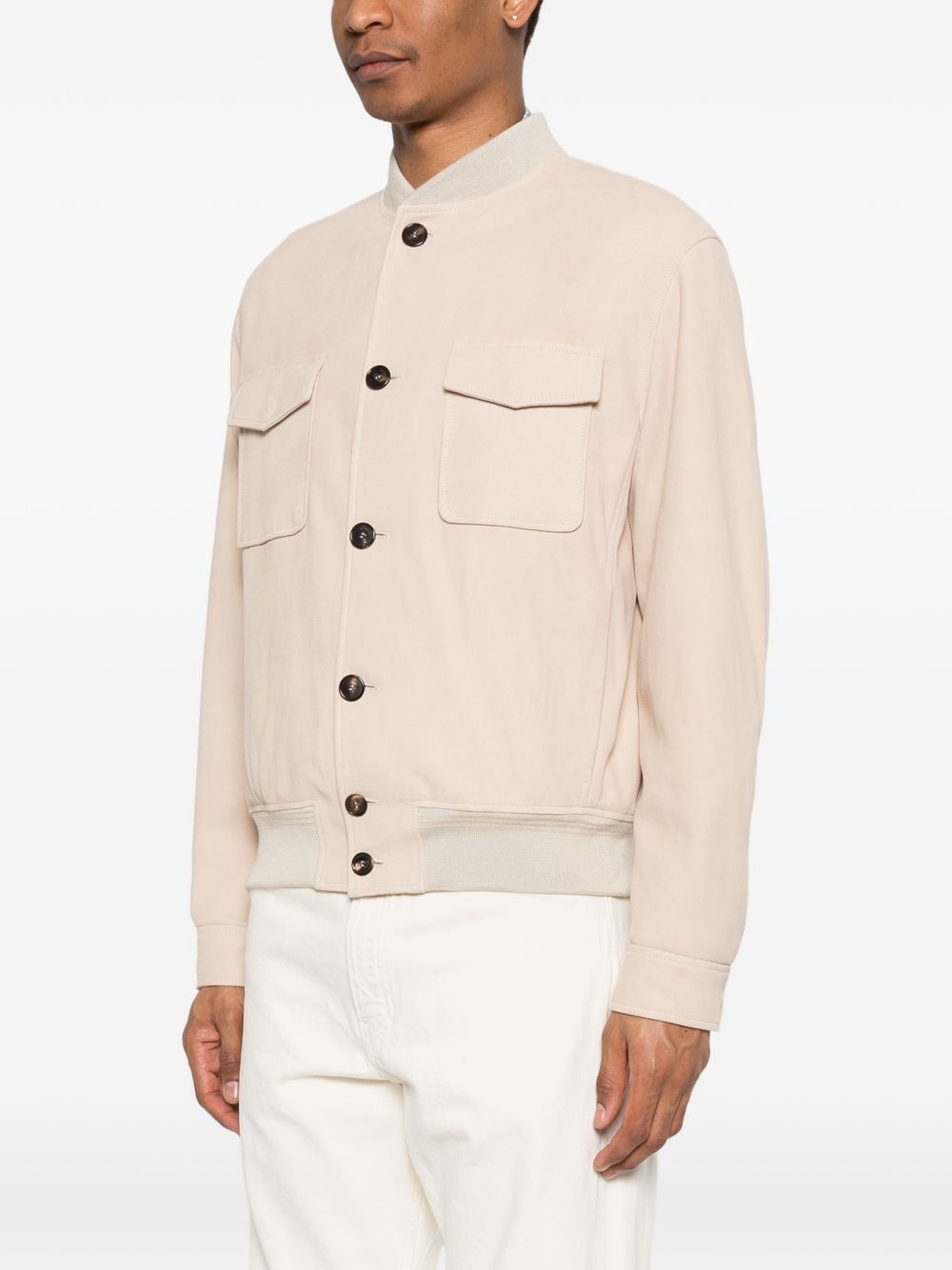 Giubbino con tasche abbottonate