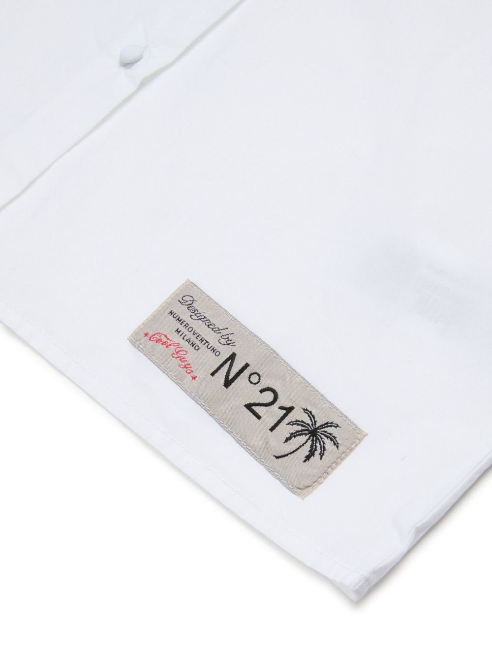 Camicia smanicata con decorazione