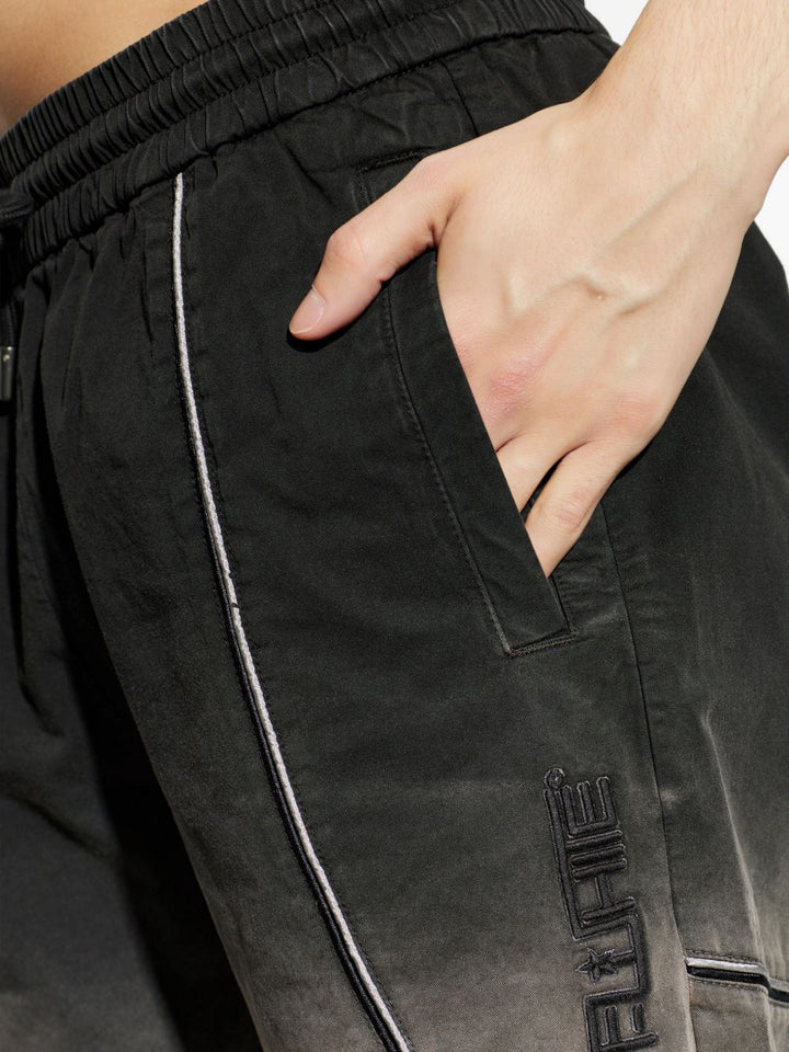 Pantaloncini con logo applicato
