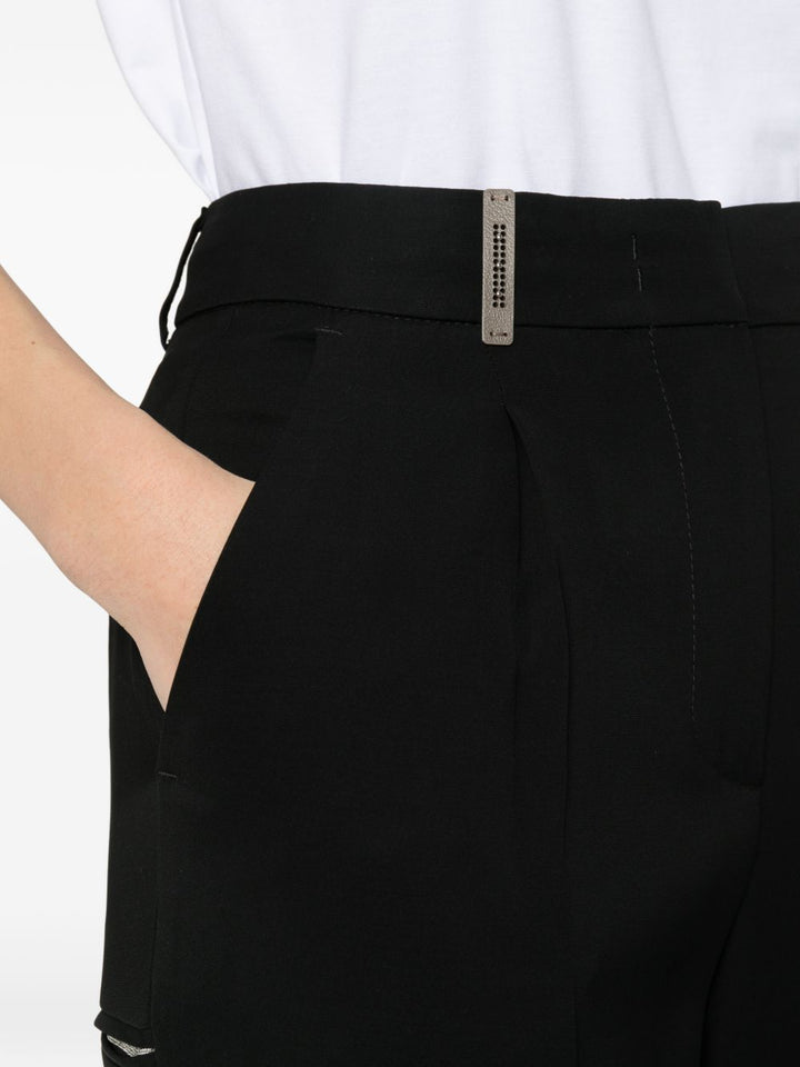 Pantalone con pieghe e dettaglio tasche
