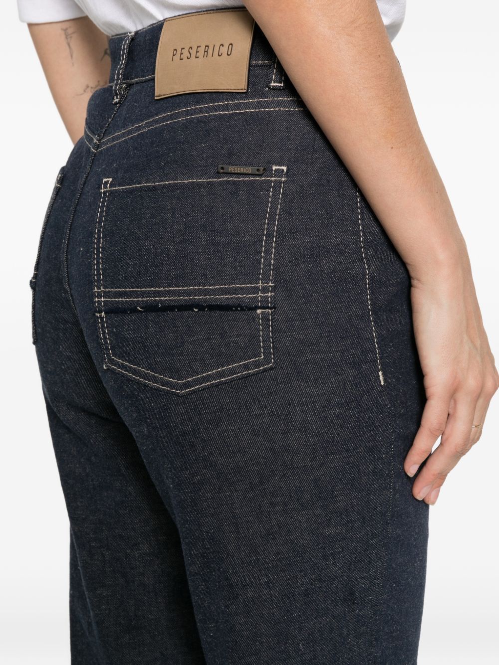 pantaloni cinque tasche con impunture