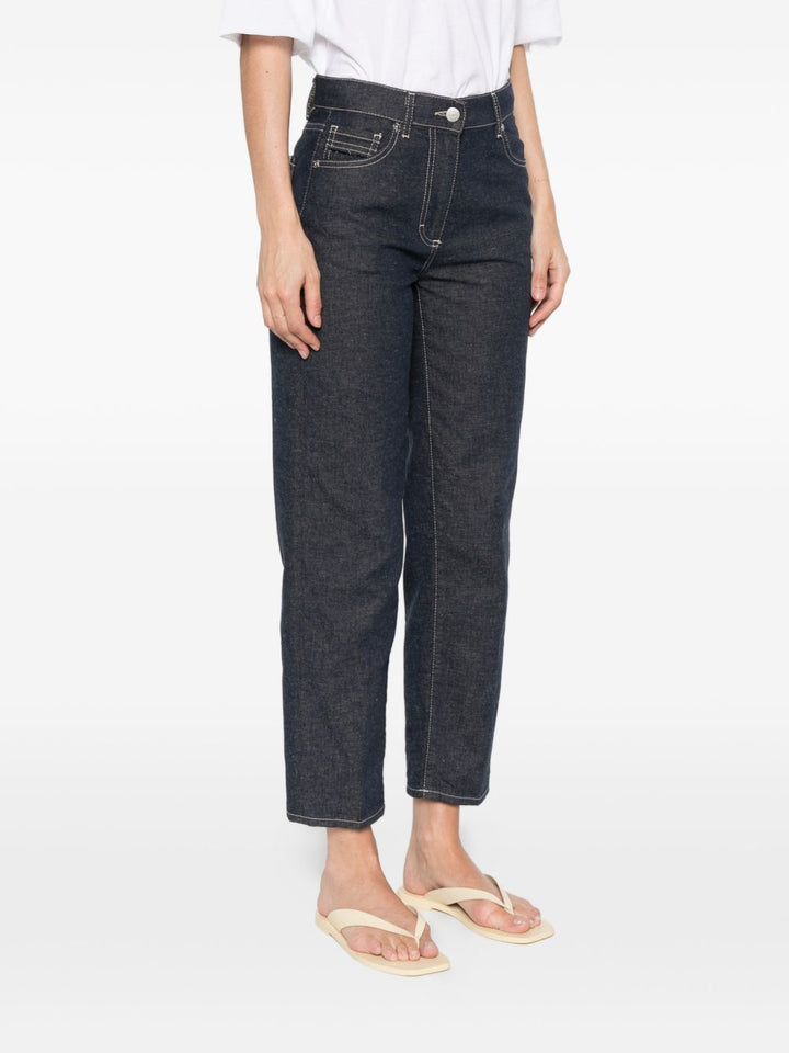 pantaloni cinque tasche con impunture